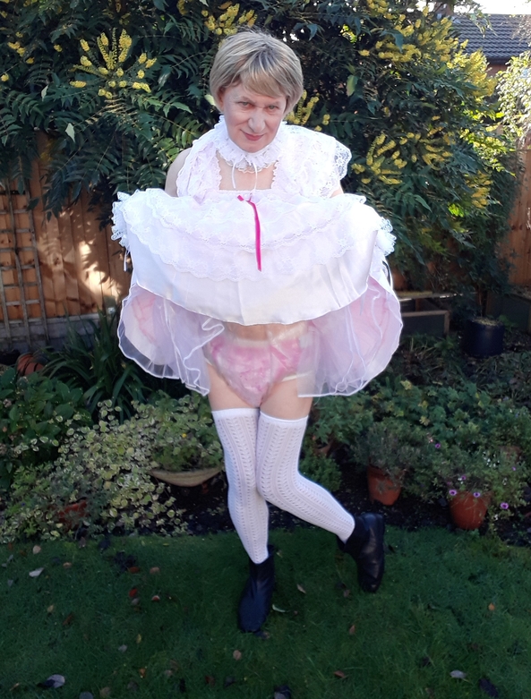 Such a lovely day to be out. - Fun in the garden, garden,outside,plastic panties,nappy,pink,sissy, Adult Babies,Diaper Lovers,Feminization,Sissy Fashion,Dared Or Bets,Dolled Up