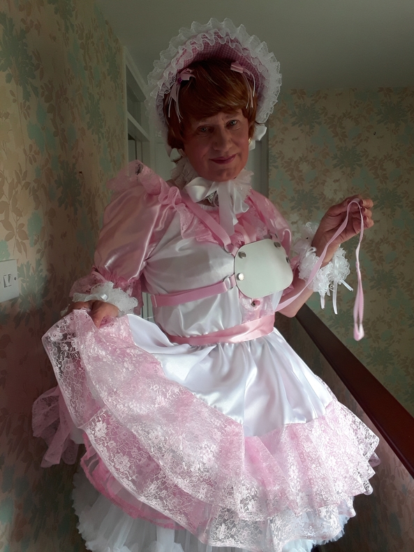 In love with pink - Showing off my pink and white dress then sent into the garden to play. Musn't get my new dress dirty though., sissy pink bonnet bloomers ribbons bows petticoats, Adult Babies,Feminization,Sissy Fashion,Dolled Up
