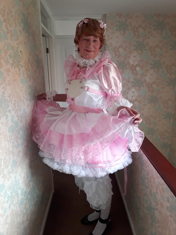 In love with pink - Showing off my pink and white dress then sent into the garden to play. Musn't get my new dress dirty though., sissy pink bonnet bloomers ribbons bows petticoats, Adult Babies,Feminization,Sissy Fashion,Dolled Up