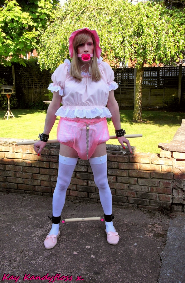 Padlocked Pansy in the Garden. - Punishment time again - Mistress Bossyboots puts me into my locking plastic panties over my nappy and buckles in my dummy gag then takes me into the garden to leave me locked between two bars so I can reflect on my poor behaviour. xxx, Sissy,sissybaby,nappy,plastic panties,dummy,gag,bondage,outdoor humiliation, Adult Babies,Feminization,Dominating Mistress Or Master,Dolled Up,Bondage,Diaper Lovers